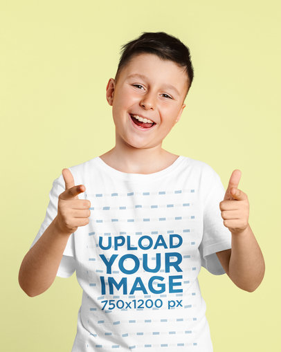 Round-Neck Tee Mockup of a Boy Pointing at the Camera with Both Hands