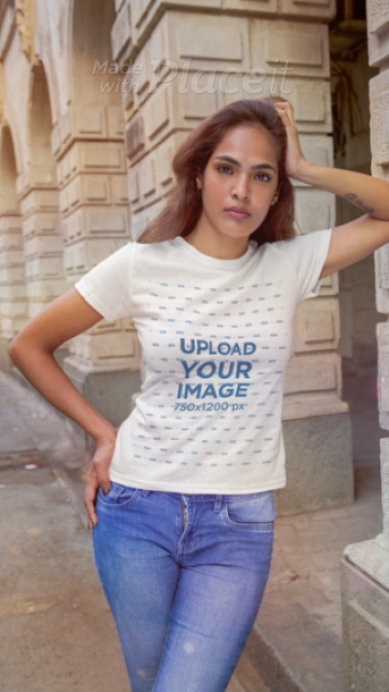 T-Shirt Video Featuring a Serious Woman Posing in the Street