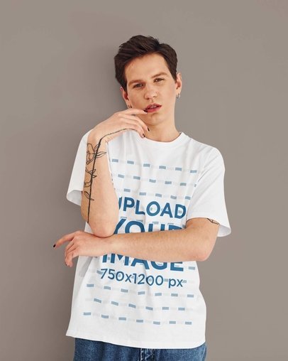 Round-Neck Tee Mockup of a Man with an Arm Tattoo and Red Lipstick