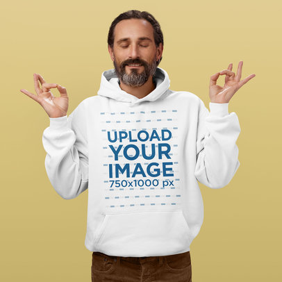 Hoodie Mockup of a Smiling Bearded Man Meditating in a Studio m24932 r-el2