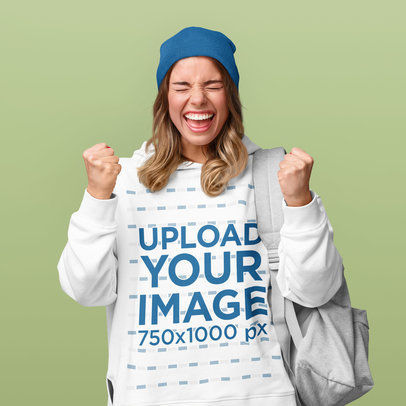 Hoodie Mockup of a Cheerful Woman Wearing a Beanie