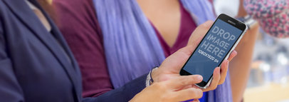 Samsung Galaxy S5 in Portrait Position Mockup of Two Female Friends at a Mall