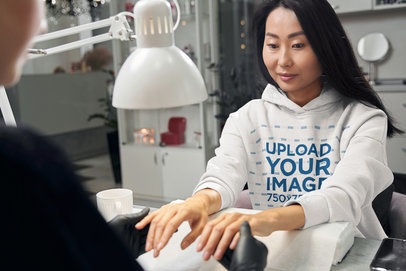 Pullover Hoodie Mockup of a Woman at a Nails Spa m21847 r-el2