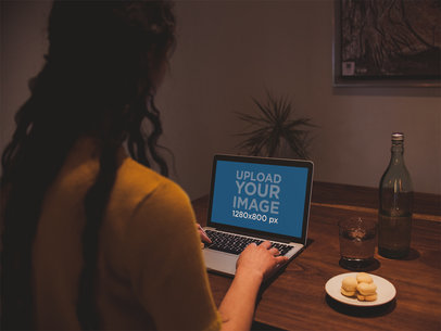 Woman Using her MacBook Pro Mockup Eating Cookies