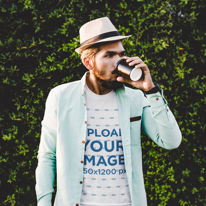 Heathered T-Shirt Mockup of a Serious Man Drinking Coffee