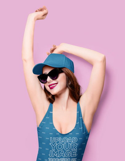 Mockup of a Woman Posing with a Sublimated Swimsuit and Sunglasses