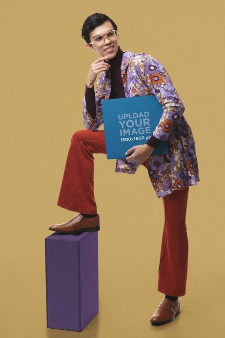 Mockup of a Man With a Groovy Look Holding a Vinyl
