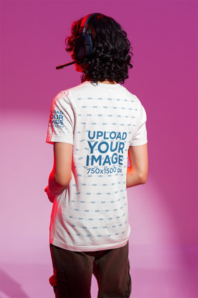 Back-View Mockup of a Man Wearing a T-Shirt and Headsets