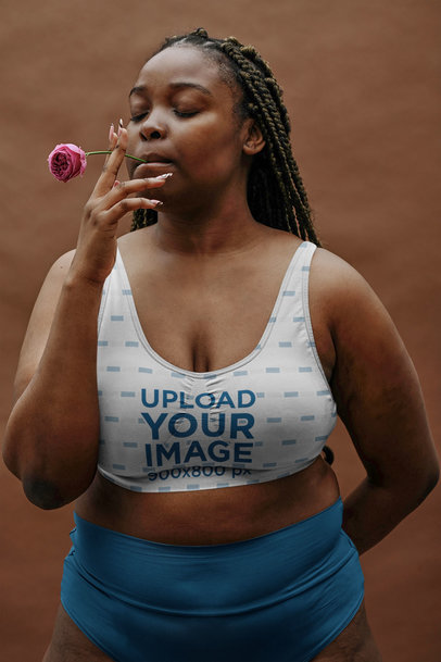 Sports Bra Mockup Featuring a Woman With a Flower on Her Mouth