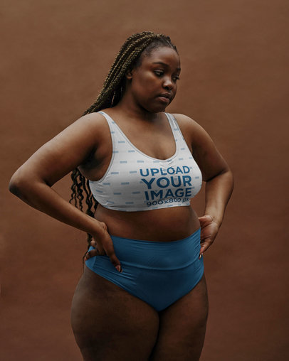Sports Bra Mockup of a Serious Woman Posing With Her Hands on Her Waist