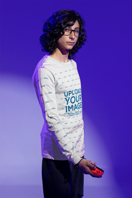 Long-Sleeve Tee Mockup of a Gamer Holding a Controller