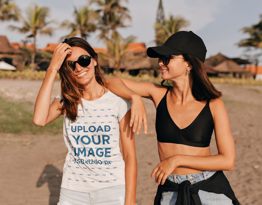 Heathered T-Shirt Mockup Featuring a Woman Enjoying the Beach With a Friend