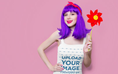 Tank Top Mockup of a Woman With Purple Hair Holding a Pinwheel Toy