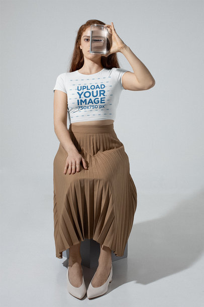 Crop Top Tee Mockup Featuring a Red-Haired Woman Holding a Glass m28396