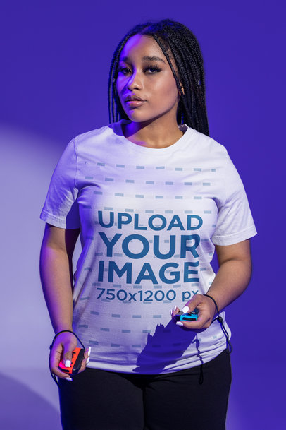 Bella Canvas Tee Mockup Featuring a Woman Playing Video Games