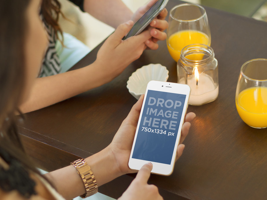 iPhone 6 Gold Mockup of Women Chatting While Eating Out