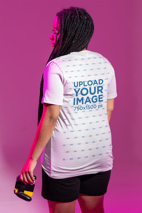 Oversized Tee Mockup of a Gamer Holding a Controller