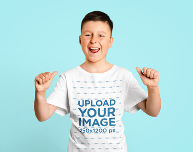 Round-Neck Tee Mockup of a Happy Kid at a Studio