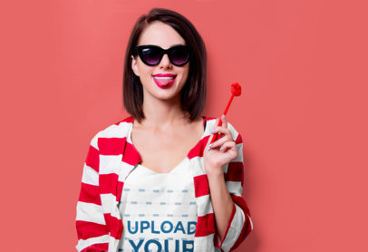 V-Neck Tank Top Mockup of a Woman with Sunglasses Holding a Pen