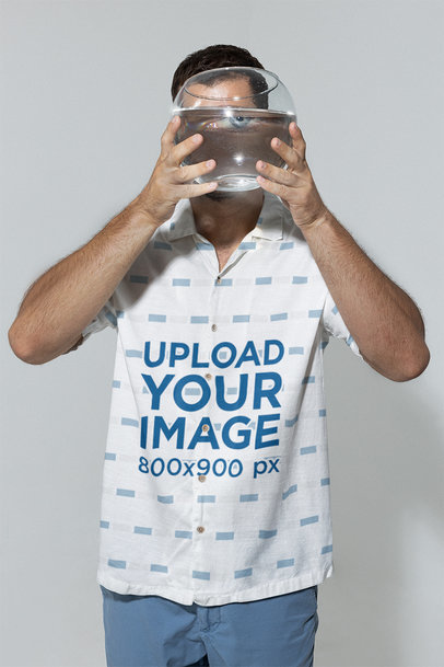 Button-Up Shirt Mockup Featuring a Man with a Fish Bowl in His Hands 