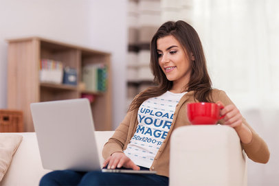 T-Shirt Mockup Featuring a Smiling Woman Working While Holding a Cup of Coffee m14225 r-el2