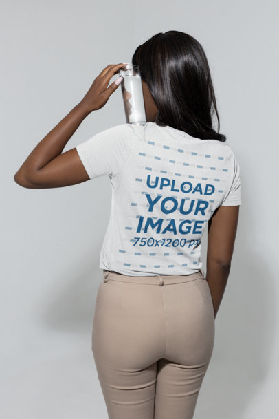 Mockup of a Woman Showing The Back of a Bella Canvas Tee 