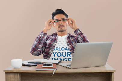 T-Shirt Mockup of a Man Adjusting His Glasses While Working m17946 r-el2