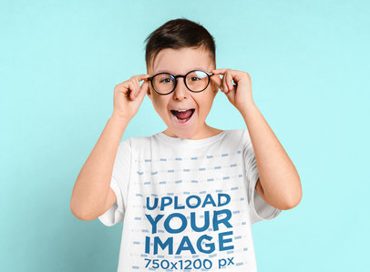 T-Shirt Mockup of a Joyful Boy Wearing Glasses