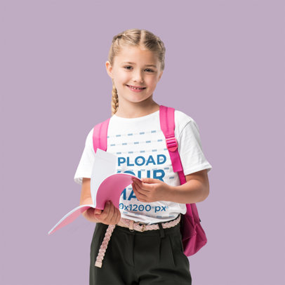 T-Shirt Mockup Featuring a Braided Happy Girl Holding a Book m2507 r-el2
