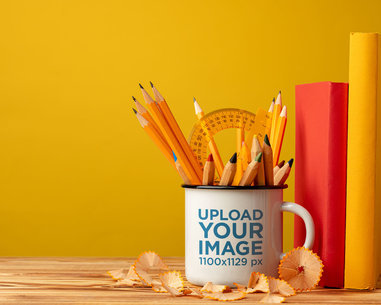 Back-To-School Mockup of an Enamel Mug With Pencils and Colors Inside It