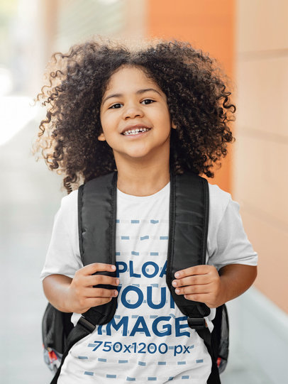 Heathered T-Shirt Mockup Featuring a Happy Boy With a Backpack