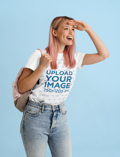 T-Shirt Mockup Featuring a Cheerful Woman Looking Aside