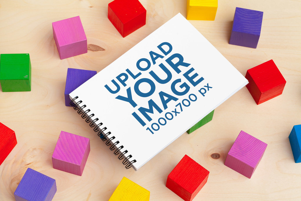 Placeit - Mockup of a Horizontal Notebook Featuring Color Blocks