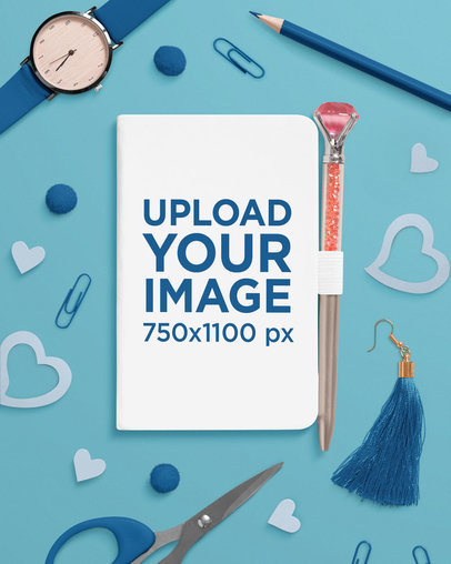 Mockup of a Notebook Next to a Pen and School Supplies m28874 r-el2