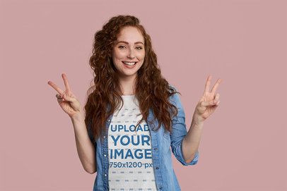 T-Shirt Mockup Featuring a Happy Red Head Woman Making the Peace Sign With Her Hands m26482 r-el2