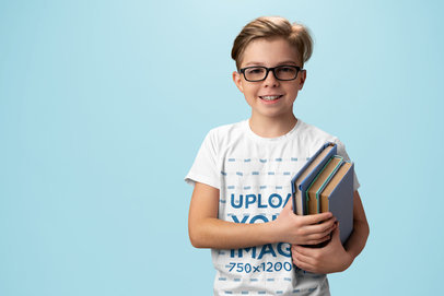 Round-Neck Tee Mockup of a Boy with Glasses Holding Books
