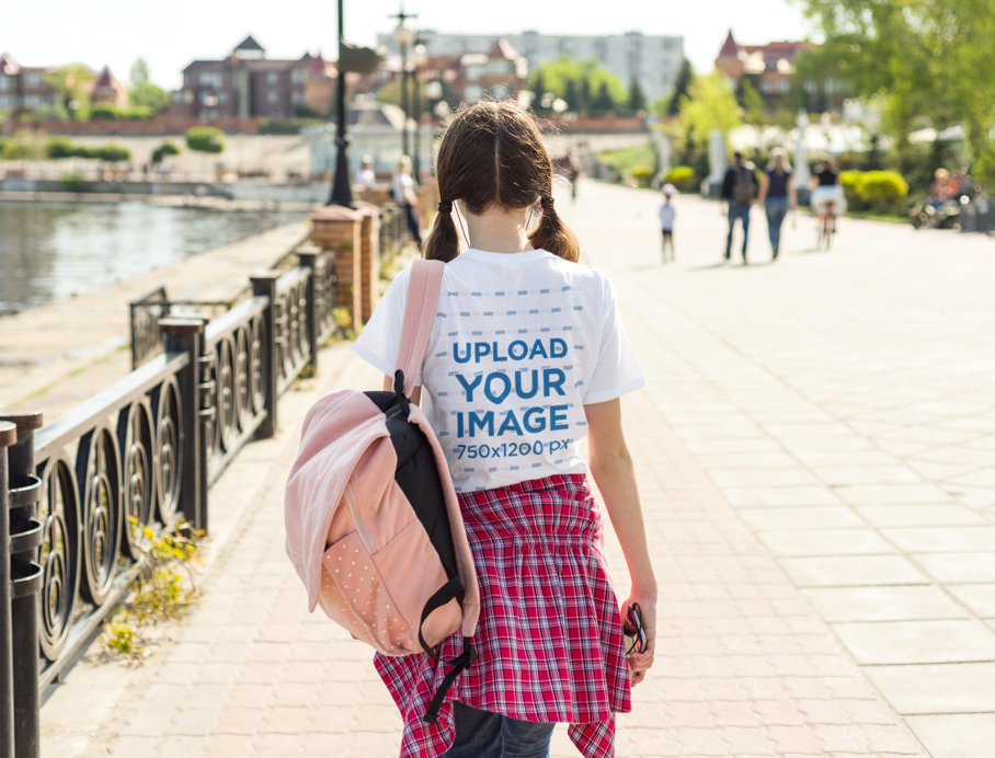 Back-View Tee Mockup of a Girl Carrying a Backpack