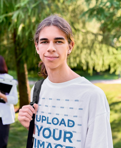 T-Shirt Mockup of a Young Student with a Backpack at a Campus