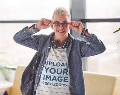 Mockup of a Young Man with Glasses Wearing a Heathered V-Neck Tee
