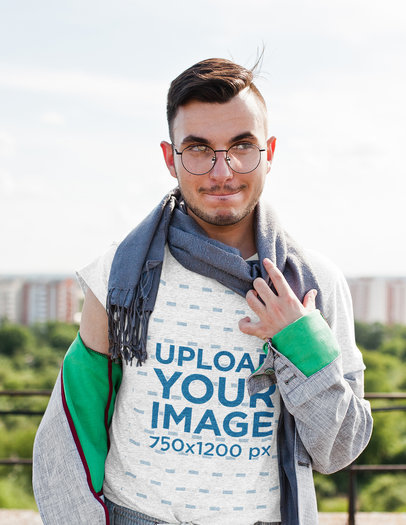 Mockup of a Man with Glasses and a Scarf Wearing a Heathered Tee