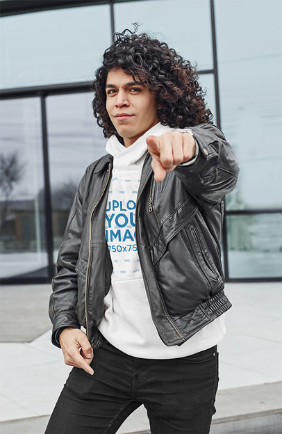 Pullover Hoodie Mockup of a Man with Curly Hair Pointing at the Camera