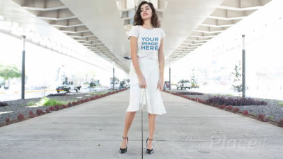 Young Woman Wearing a Long Skirt and a T-Shirt Stop Motion in an Urban Environment