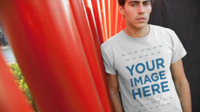 Dude Wearing Tshirt Video in Amphitheater Concrete Stage and Red Structure a13752