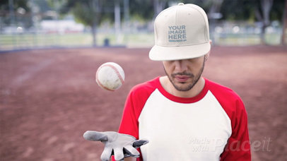 Dude Wearing a Hat in Stop Motion on a Baseball Field Playing With The Ball