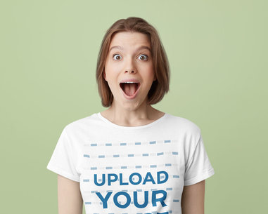 Rounded-Neck T-Shirt Mockup of a Woman Doing a Surprise Facial Expression