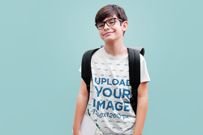 Heathered T-Shirt Mockup of a Boy with Glasses and a Backpack