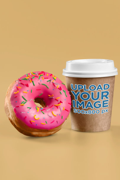 Mockup of a Paper Cup Placed Next to a Donut m29030 r-el2