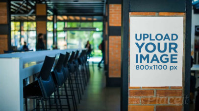 Poster Video on a Bricks Wall Outside a Cafe Mockup