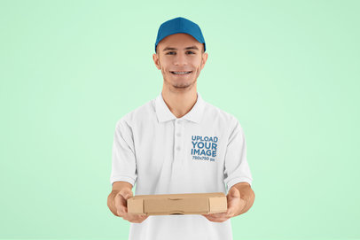 Polo Shirt of a Happy Man Holding a Delivery Package