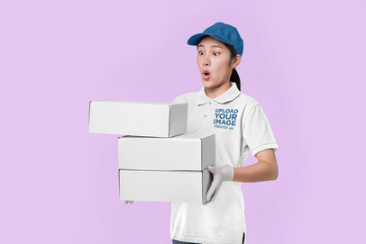Polo Shirt Mockup of a Surprised Woman Holding Three Boxes